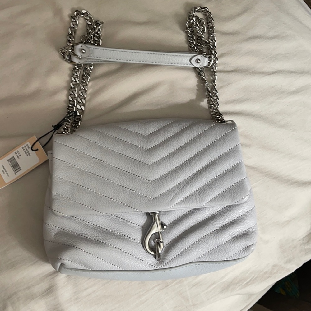 Light grey crossbody bag.